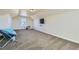 Spacious bonus room with neutral carpeting and a window at 738 S Main St, Byers, CO 80103