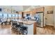 Modern kitchen with stainless steel appliances and an island at 738 S Main St, Byers, CO 80103