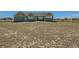Spacious backyard offering privacy and open space at 738 S Main St, Byers, CO 80103