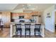 Updated kitchen with stainless steel appliances and island at 738 S Main St, Byers, CO 80103