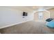 Large bonus room perfect for entertainment or relaxation at 738 S Main St, Byers, CO 80103