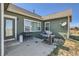 Backyard with patio and built-in gas grills at 738 S Main St, Byers, CO 80103