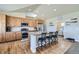 Modern kitchen with stainless steel appliances and an island at 738 S Main St, Byers, CO 80103