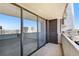 Private balcony with glass doors offering city views at 1020 15Th St # 37I, Denver, CO 80202