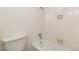 Clean bathroom with shower/tub combo and white tile at 1020 15Th St # 37I, Denver, CO 80202