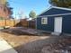 Private backyard with detached garage and patio at 4542 Sheridan Blvd, Denver, CO 80212