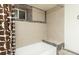 Clean basement bathroom with tub and shower at 4542 Sheridan Blvd, Denver, CO 80212