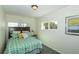 Cozy bedroom with a double bed and plenty of natural light at 4542 Sheridan Blvd, Denver, CO 80212