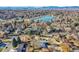 Neighborhood view with lake and mountain backdrop at 8160 W 81St Pl, Arvada, CO 80005