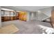 Spacious finished basement, carpeted, with wood paneling at 8160 W 81St Pl, Arvada, CO 80005