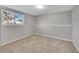 Basement bedroom with neutral walls and carpeting at 8160 W 81St Pl, Arvada, CO 80005