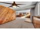 Finished basement area with wood paneling and fireplace at 8160 W 81St Pl, Arvada, CO 80005