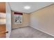 Simple bedroom with neutral walls and carpeting at 8160 W 81St Pl, Arvada, CO 80005