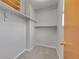 Large walk-in closet with shelving and hanging rods at 8160 W 81St Pl, Arvada, CO 80005