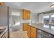 Kitchen boasts granite countertops and ample cabinet space at 8160 W 81St Pl, Arvada, CO 80005