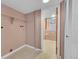Basement laundry room with shelving and flooring at 8160 W 81St Pl, Arvada, CO 80005