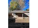 Covered patio with concrete slab and fenced backyard at 3658 S Norfolk Way, Aurora, CO 80013
