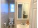 Clean bathroom with toilet, sink, and vanity at 523 W 8Th Ave, Denver, CO 80204