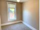 Cozy bedroom with carpeted floors and a window at 523 W 8Th Ave, Denver, CO 80204