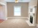 Bright living room featuring a fireplace and hardwood floors at 523 W 8Th Ave, Denver, CO 80204