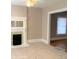 Open living room with hardwood floors and a fireplace at 523 W 8Th Ave, Denver, CO 80204