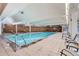 Indoor pool with lounge chairs, perfect for relaxing after a long day at 955 Eudora St # 204E, Denver, CO 80220