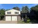 Two-story home with a two-car attached garage at 3006 S Fenton St, Denver, CO 80227
