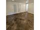 Finished basement featuring a large open area and tile floors at 3006 S Fenton St, Denver, CO 80227