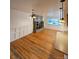 Bright dining room with hardwood floors and a built-in hutch at 3006 S Fenton St, Denver, CO 80227