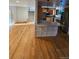 Kitchen with hardwood floors and a breakfast bar at 3006 S Fenton St, Denver, CO 80227