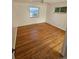 Spacious bedroom featuring hardwood floors and large windows at 3006 S Fenton St, Denver, CO 80227