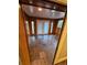Bright sunroom with slate tile floor and access to the outdoors at 3006 S Fenton St, Denver, CO 80227