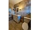 Bathroom with tile, vanity, and copper sink at 3006 S Fenton St, Denver, CO 80227