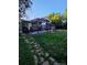 Landscaped backyard with deck and pergola at 3006 S Fenton St, Denver, CO 80227
