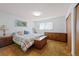 Main bedroom with ample closet space and neutral decor at 580 S Parfet St, Lakewood, CO 80226