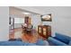Dining area with hardwood floors and view of the kitchen at 580 S Parfet St, Lakewood, CO 80226