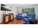 Living room with hardwood floors and comfy armchairs at 580 S Parfet St, Lakewood, CO 80226