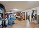 Finished basement with storage shelving and exercise equipment at 580 S Parfet St, Lakewood, CO 80226