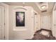 Bright condo entryway with tiled floor and artwork at 1705 Gaylord St # 107, Denver, CO 80206