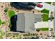 Overhead view of house, yard, and driveway at 17939 W 94Th Dr, Arvada, CO 80007