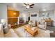 Virtually staged living room with wood floors at 1500 Sanchez Ct, Platteville, CO 80651