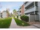 Well-maintained community with grassy areas and walkways at 14218 E 1St Dr # A05, Aurora, CO 80011