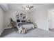 Bright bedroom with carpeted floors and plenty of natural light at 14218 E 1St Dr # A05, Aurora, CO 80011