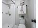 Updated bathroom with a shower/tub combo and marble-look flooring at 14218 E 1St Dr # A05, Aurora, CO 80011