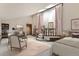 Spacious bedroom with high ceilings and a sitting area at 26600 Mowbray Ct, Evergreen, CO 80439