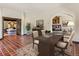 Home office with built-in bookshelves and a view into another room at 26600 Mowbray Ct, Evergreen, CO 80439
