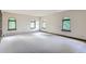 Well-lit bedroom with arched windows and neutral decor at 26600 Mowbray Ct, Evergreen, CO 80439