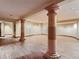 Spacious basement with hardwood floors and large columns at 26600 Mowbray Ct, Evergreen, CO 80439