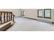 Bright bedroom featuring hardwood floors and scenic views at 26600 Mowbray Ct, Evergreen, CO 80439