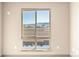 Bedroom window view of mountain range and neighborhood at 12983 W Ida Ave # 305, Littleton, CO 80127